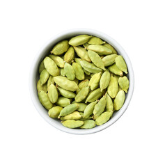 Ceramic plate with green cardamom seeds isolated on white, top view.