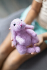 girl holding a rabbit