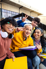 Multiracial gen z friends taking selfie with phone outside university building. College students having fun. Vertical. - obrazy, fototapety, plakaty