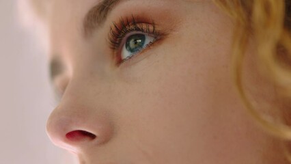 Face, blue eyes or vision for business woman, creative designer or worker with innovation ideas or motivation. Zoom, strategy or thinking employee with startup, small business goals or growth mindset