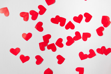 Heap of many red paper hearts isolated on white background. Abstract background. Valentine's Day concept.