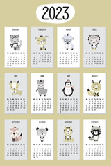 Calendar 2023 with cute animals in scandinavian style. Printable calendar grid template, monday first, twelve months. Forest wildlife and home pets. Hand drawn card, poster.