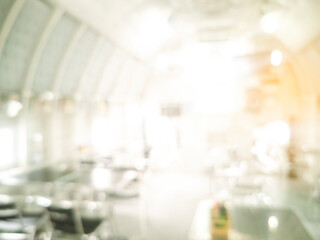 White Blurred background bright restaurant shopping mall Silver gray lighting. defocused store light bokeh in retail shop. Blurry off white Backdrop hospital bright softness hotel with copy space