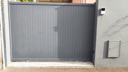 Aluminum steel sliding modern gate portal of suburb house door