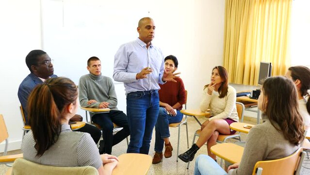 Coach conducts business training at the university