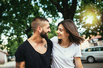 Romantic couple in love spending time together outdoors.