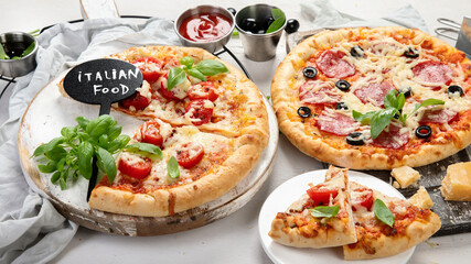 Freshly baked pizza on dark background.