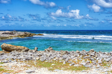 Fototapeta na wymiar Rough shoreline of the east coast of the tropical island of Bonaire