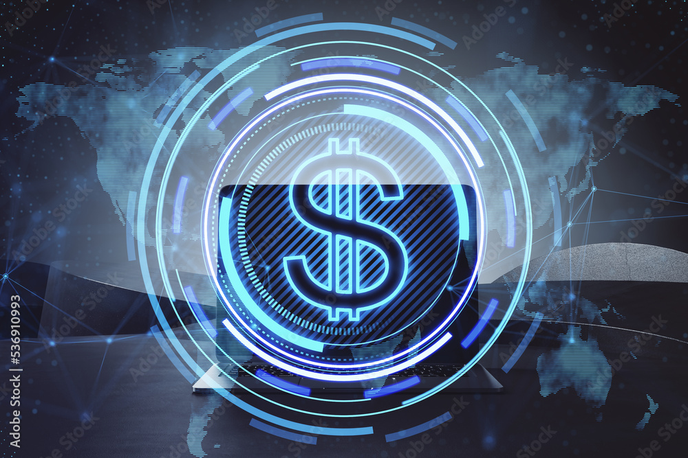 Poster close up of laptop on desktop with creative glowing round dollar icon and map hologram on blurry bac