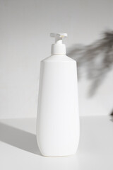 Cosmetic bottle with dispenser for mockup with shadows