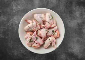 Raw chicken wings Poultry meat on a grey background. Top view