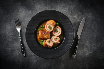 Pork roulade with pickles and bacon, served with demiglace meat sauce