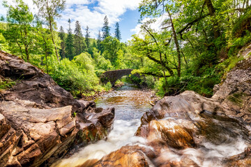 Scenic view of flowing water in Eas Chia-Aig river