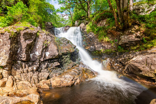 Scenic view of Eas Chia-Aig waterfall in forest