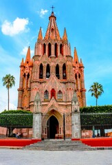 Vertical shot of the facade of Parroquia de San Miguel Arcangel Catholic church in Mexico