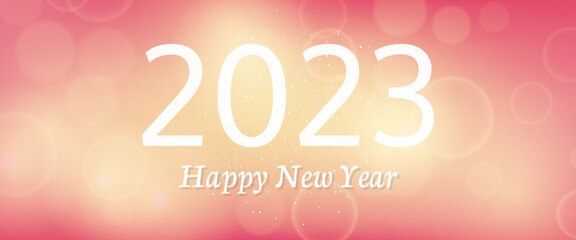Happy new year 2023 incription on blurred background