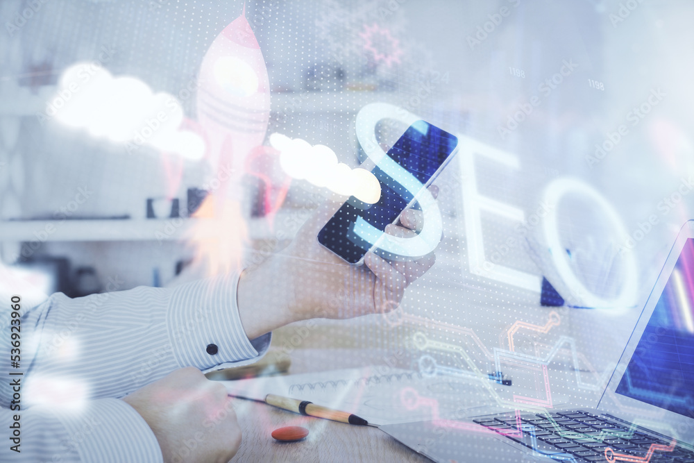Poster multi exposure of man's hands holding and using a digital device and seo drawing. search optimizatio