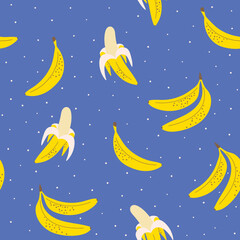 Obraz na płótnie Canvas Seamless pattern with bananas and dots on blue background. Hand drawn fruit fabric design. Children's background. For textiles, clothing, bed linen, office supplies.