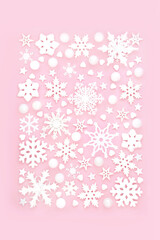Christmas snowflake festive background design with star and heart shape decorations. Traditional symbols for winter, Xmas and New Year holiday season.