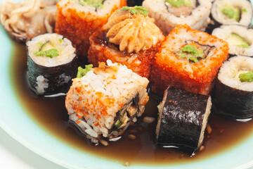 Sushi rolls japanese food on a plate top view