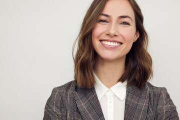 Portrait of a young happy business woman smiling, looking beautiful and professional. Looking confident in camera with a perfect smile.	 - 536927915