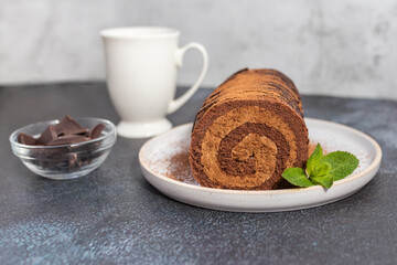 Home made chocolate roll cake filled with chocolate cream. 
