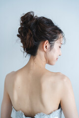 Fototapeta premium ウェディングドレスを着た花嫁