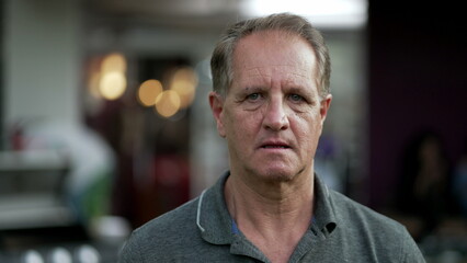 Obraz premium One older man with worried expression. Senior person with baffled confused emotion looking at camera. Shocked expression