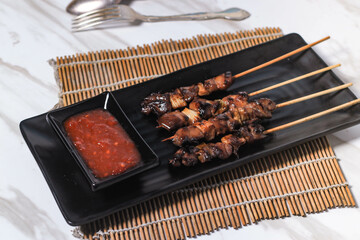 Chicken satay with delicious chili sauce