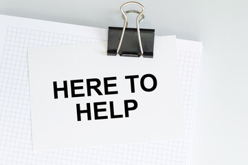 text WE ARE HERE TO HELP . Business concept