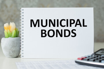 Municipal bonds text on notepad on table. business and finance concept.