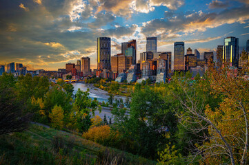 Fototapeta na wymiar Sunset above city skyline of Calgary with Bow River, Canada