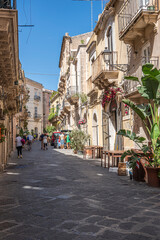 Fototapeta na wymiar Characteristic street in the historic center of Ortigia