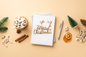 Winter concept. Top view photo of notepad merry christmas wooden text pen wood ornaments fir branch...