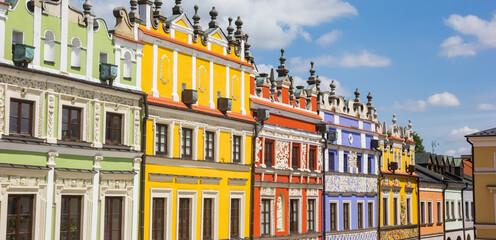 Panorama of the colorful houses on the market square in Zamosc, Poland
