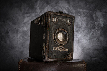 Vintage small box camera. Classic old fashioned retro style photographic equipment.