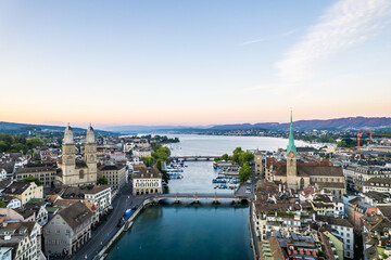 Aerial drone shot flying above Lake Zurich, Switzerland in sunny day. 