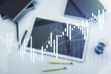 Double exposure of abstract creative financial diagram and modern digital tablet on background, banking and accounting concept