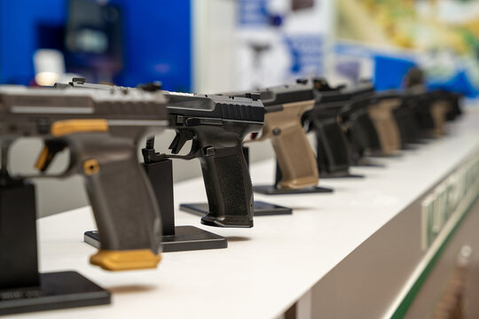 Grips of Pistols Sorted in the Gun Shop