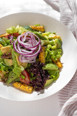 Healthy food Salad with edamame and avocado vegetables on white background for restaurant menu.