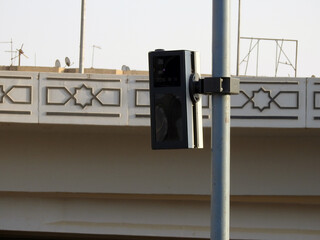 An infrared traffic radar, speed trap camera ready to monitor vehicles that exceeds the speed limit, a fixed photo modern speed radar and monitors different traffic violations, selective focus