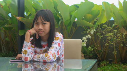 A beautiful girl at the rooftop of a hotel