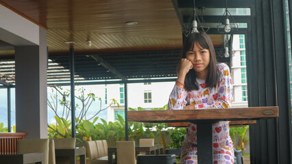 A beautiful girl at the rooftop of a hotel