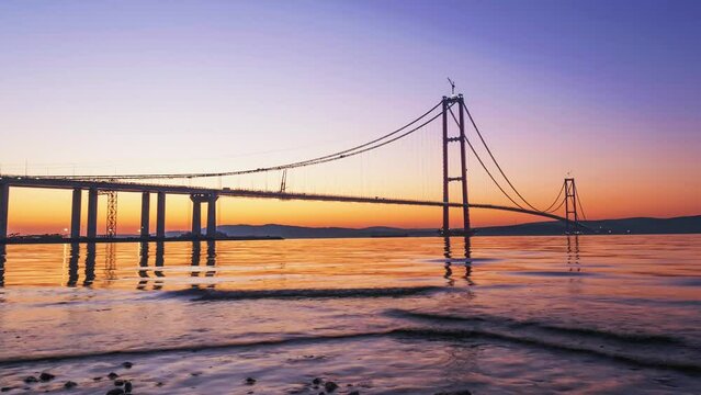 Time Lapse. The 1915  Canakkale Bridge at sunset. largest suspension bridge in the world. 4K