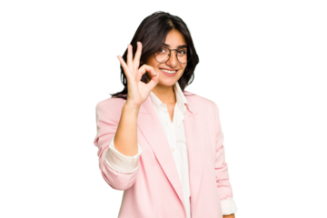 Young Indian business woman wearing a pink suit isolated cheerful and confident showing ok gesture.