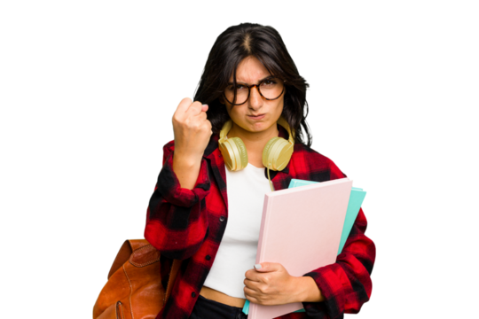Young student Indian woman wearing headphones isolated showing fist to camera, aggressive facial expression.