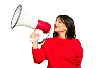Young Indian woman holding a megaphone isolated - obrazy, fototapety, plakaty