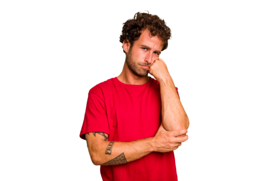 Young caucasian curly hair man isolated Young caucasian man with curly hair isolated who feels sad and pensive, looking at copy space.
