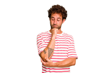 Young caucasian curly hair man isolated Young caucasian man with curly hair isolated looking sideways with doubtful and skeptical expression.