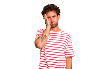 Young caucasian curly hair man isolated Young caucasian man with curly hair isolated who feels sad and pensive, looking at copy space.